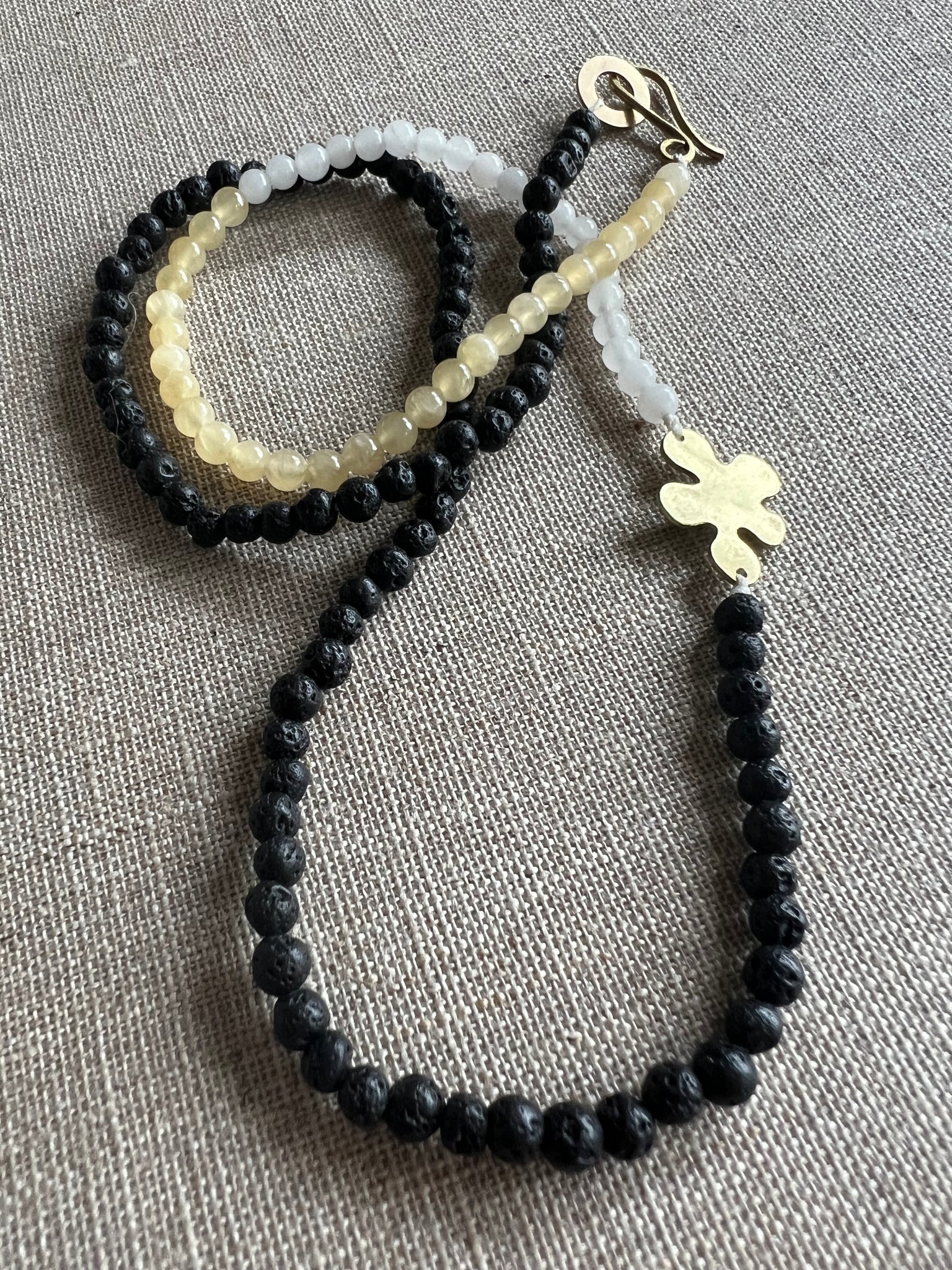 BEADED - Brass flower semi-precious bead necklace in black and white tones